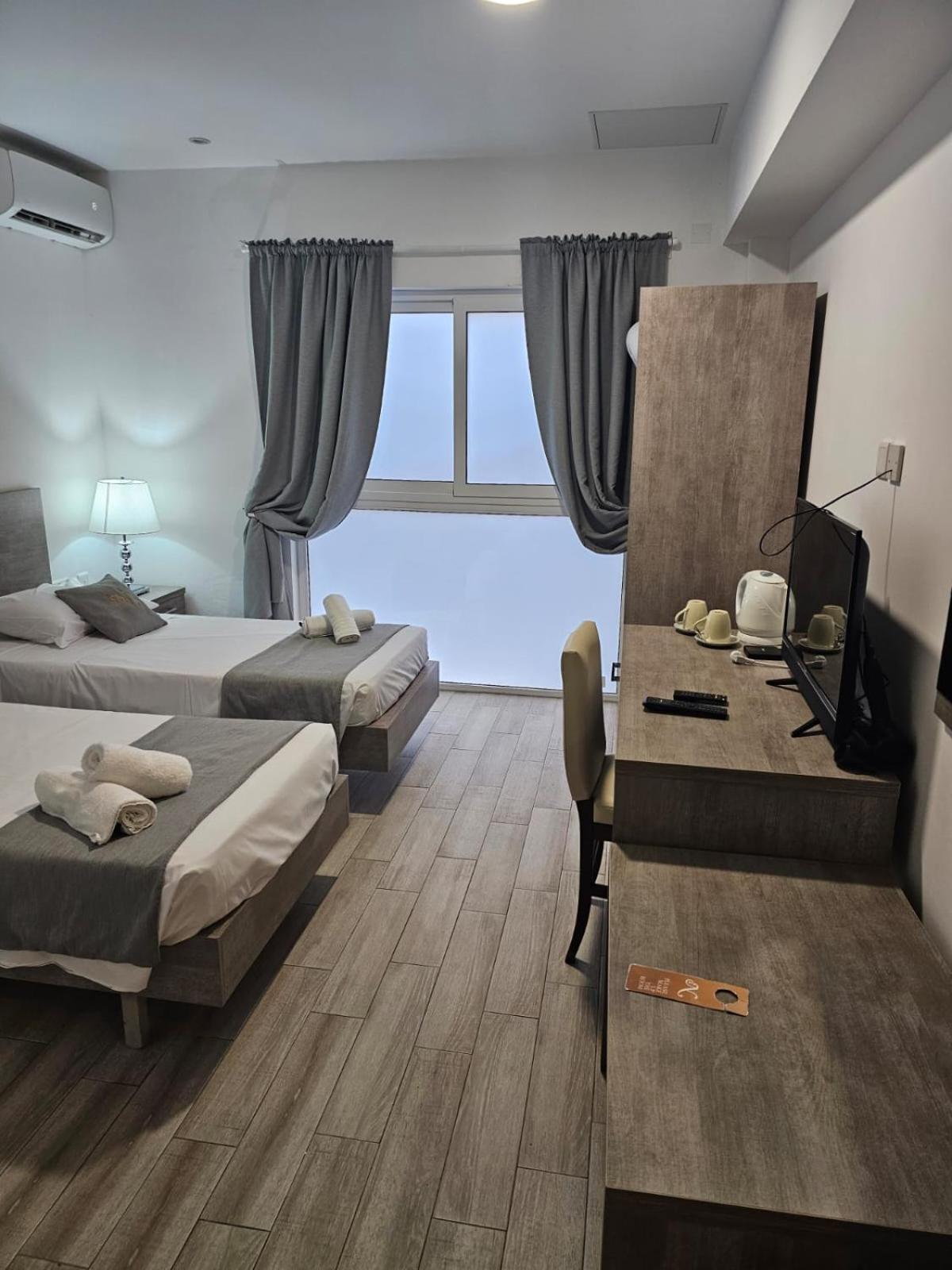 Napoli Suites San Ġiljan Buitenkant foto